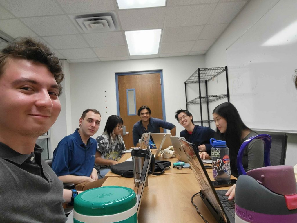 Team Tactica working together in a meeting room