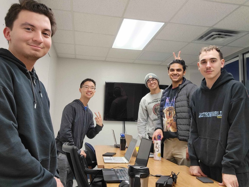 Team Tactica in a meeting room.