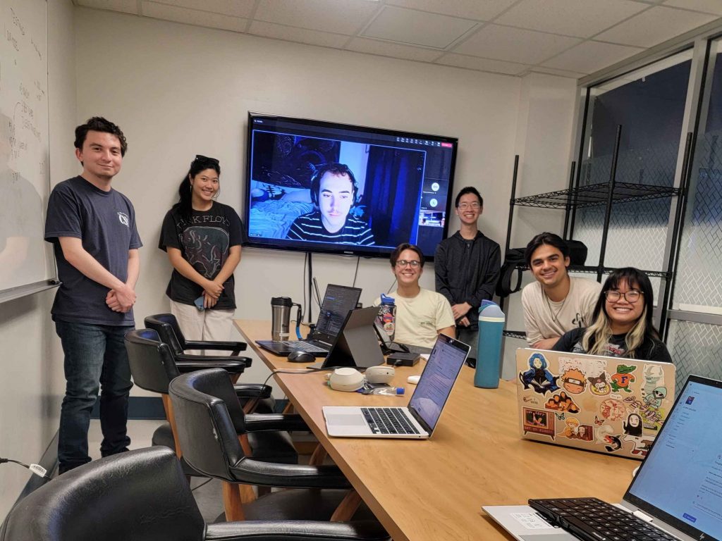 Team Tactica in a meeting room.